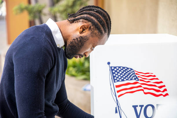 istock Millenial Black Man Voting in Election 1170722631