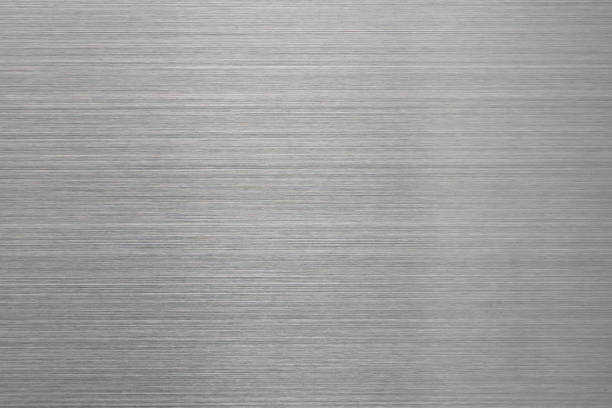 Empty brushed metal surface. Abstract background for design and backdrop Empty brushed metal surface. Abstract background for design and backdrop. stainless steel photos stock pictures, royalty-free photos & images