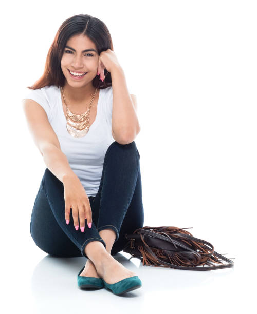 istock Cute female sitting on the ground 1170725622