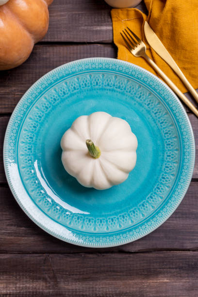 istock Close up plate with decor white pumpkin 1170728421