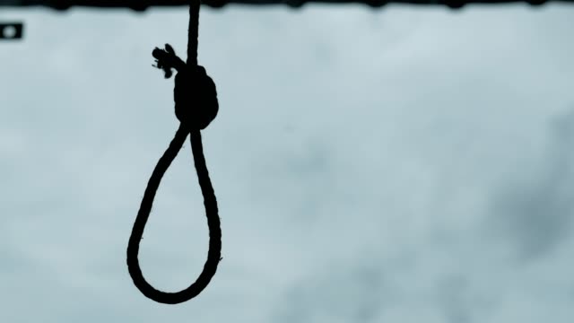 Silhouette of Hangman's noose knot. commit suicide concept.