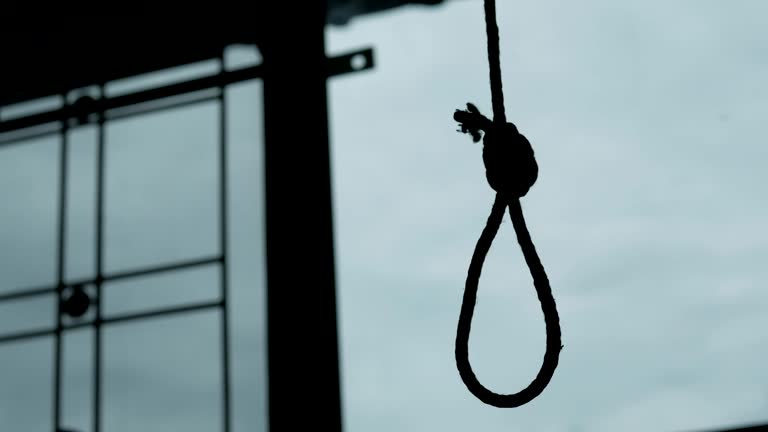 Silhouette of Hangman's noose knot. commit suicide concept.