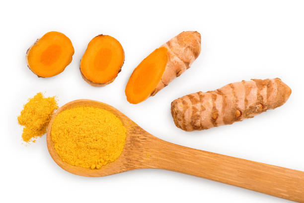 istock Turmeric powder and turmeric root isolated on white background. Top view. Flat lay 1170730439