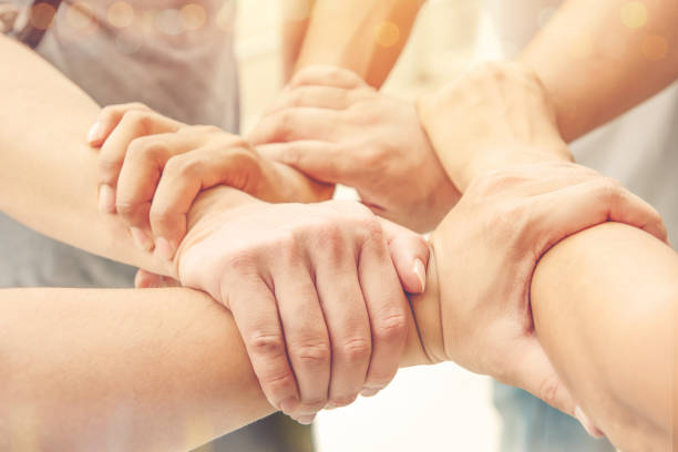 istock together collaborate of hands teamwork in meeting room office 1170731456