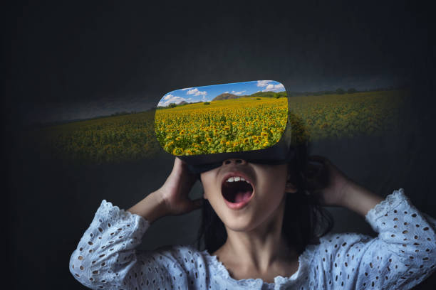 istock Abstract image of virtual reality experience, a girl in VR glasses 1170731617