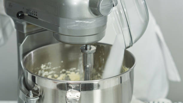 istock Mixing ingredients in standing kitchen mixer to bake sugar cookies. 1170732909