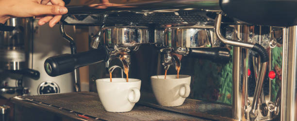 istock Hand make coffee shot with the espresso machine in the espresso bar 1170732998