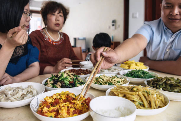 chinese family having various dishes for lunch