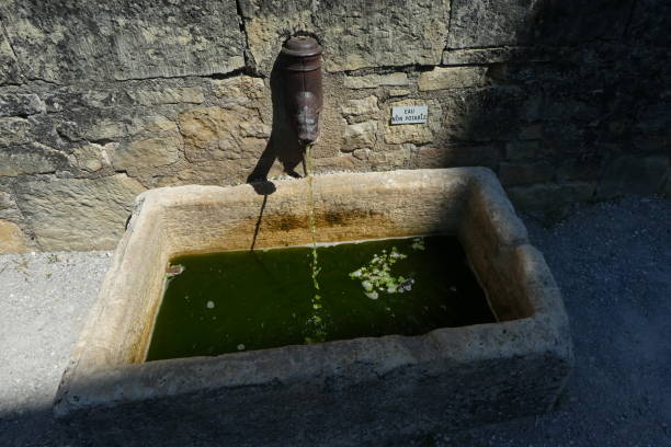 istock village fountain 1170734494
