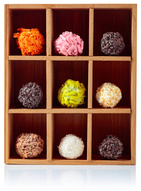 istock Various chocolate candy in wooden box. 1170735830