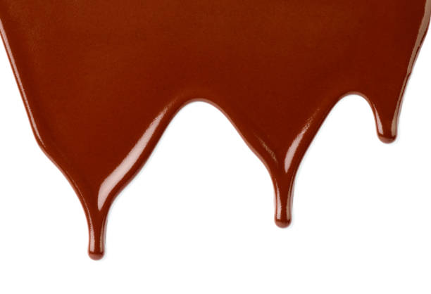 istock chocolate syrup dessert food sweet leaking drop 1170736839