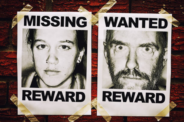 Kidnapping: Posters seeking missing young woman and scary-looking criminal Wanted and Missing posters next to each other on a wall. serial killings photos stock pictures, royalty-free photos & images