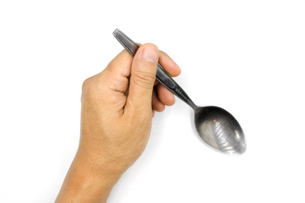 istock A male hand holding spoon, man hand  isolated on white background 1170739272