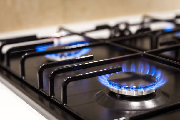 istock Blue flames on gas stove burner at home 1170740763