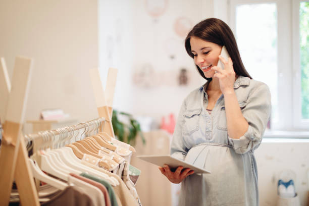 istock Young woman in a shopping store 1170741332
