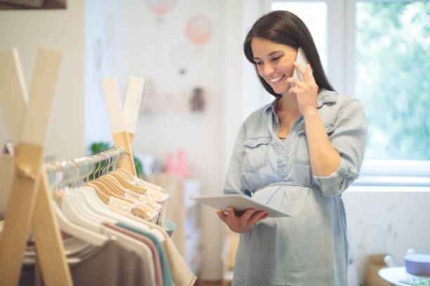 istock Young woman in a shopping store 1170741438