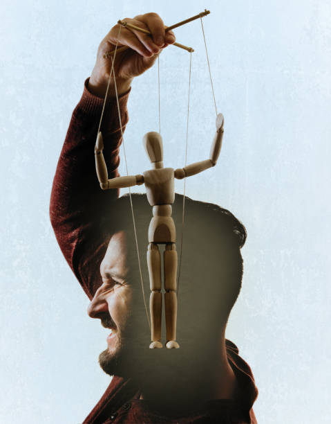 istock Man take out the puppet of his head. 1170746122