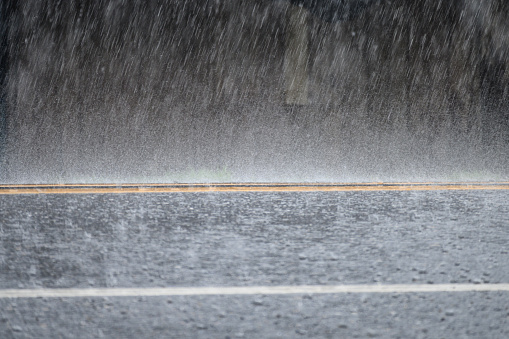 Raining storm on the asphalt road