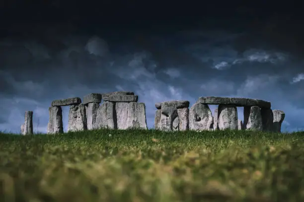 Stonehenge is a prehistoric monument in Wiltshire, England, two miles (3 km) west of Amesbury. It consists of a ring of standing stones