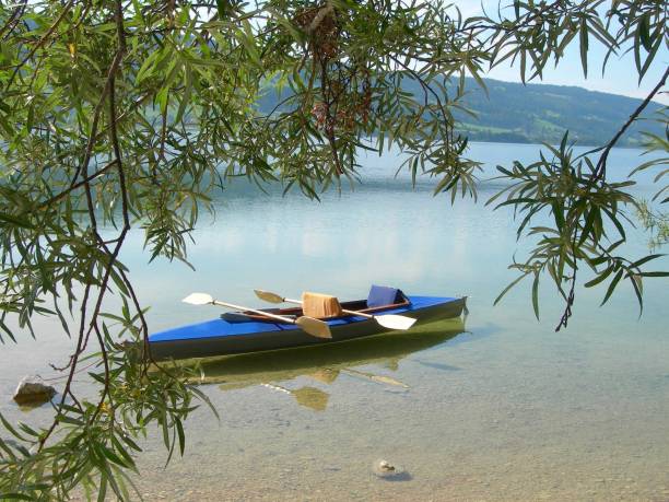 Paddle boat on a lake, vintage GDR, Faltboot Kolibri, built in the 50s