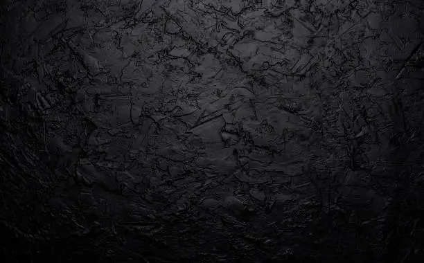Photo of Black stone texture, dark slate background, top view