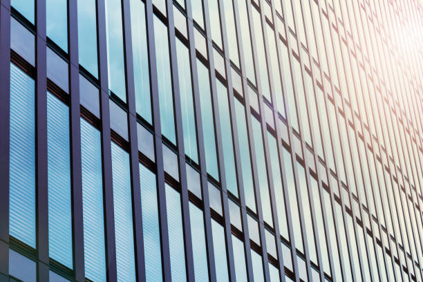 istock business building Sunset blue sky reflection on windows 1170752208