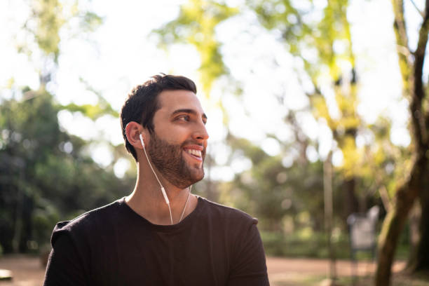 istock Man in a park, looking away 1170753331