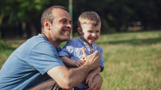 istock Single father and son hanging out outdoors 1170755288