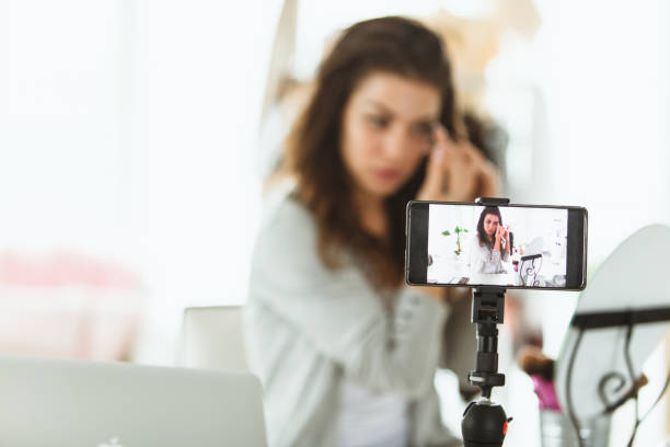 istock Young female blogger doing a live stream on the internet 1170756619