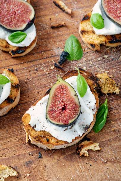 istock Fresh figs with ricotta cheese and fresh basil. 1170756900