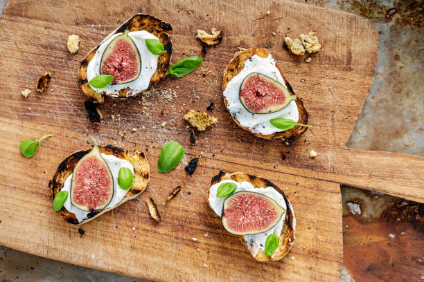 istock Fresh figs with ricotta cheese and fresh basil. 1170757138