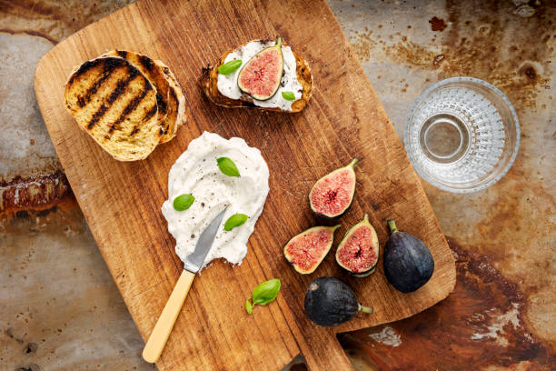 istock Fresh figs with ricotta cheese and fresh basil. 1170757269