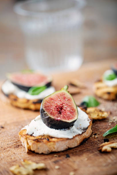istock Fresh figs with ricotta cheese and fresh basil. 1170757858
