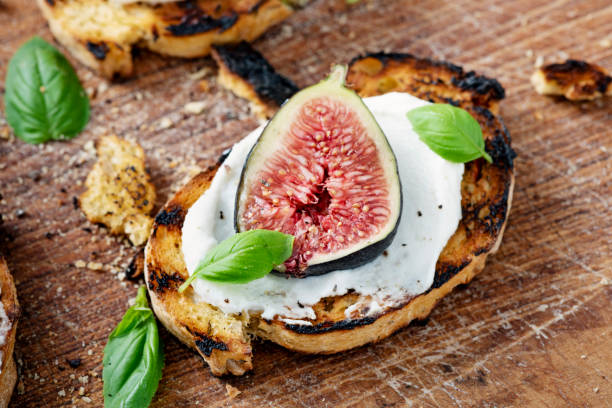 istock Fresh figs with ricotta cheese and fresh basil. 1170757863