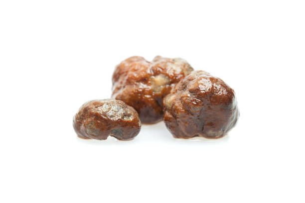 istock White gourmet truffle mushroom isolated on white background. Concept Gurman 1170760759