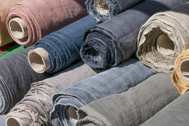 istock Rolls of linen canvas textile on market stall 1170763488