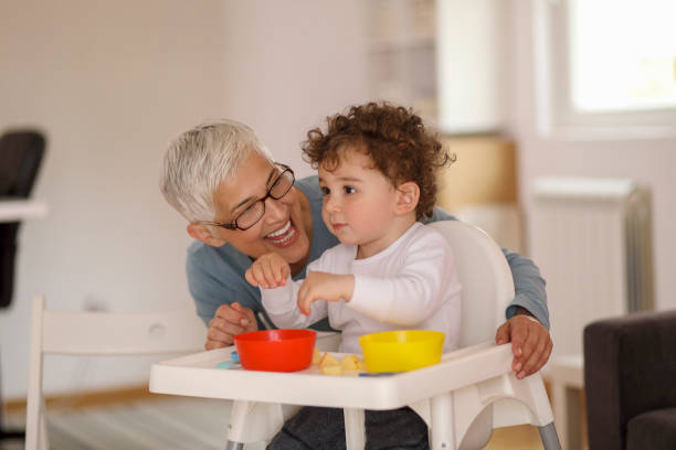 istock Grandmother playing with her grandson 1170764251