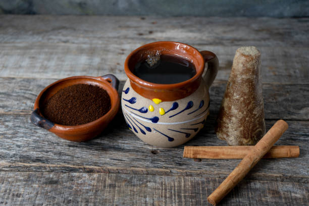 istock mexican cup of coffee with cinnamon on wooden background 1170767564