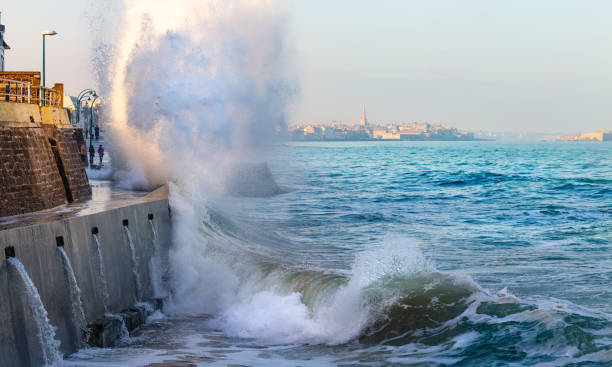 Big wave crushing during high tide in Saint-Malo stock photo