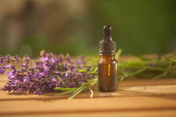 istock lavender essential oil in  beautiful bottle on table 1170775093