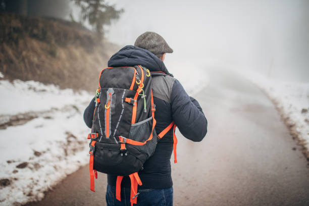 istock Senior man trail hiking 1170775438
