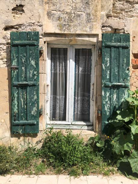 istock Beautiful Old Window on a French Stone Hous 1170778744