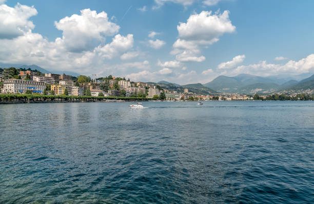 landscape of lake lugano with lugano city on background in summer day. - switzerland ticino canton lake lugano imagens e fotografias de stock