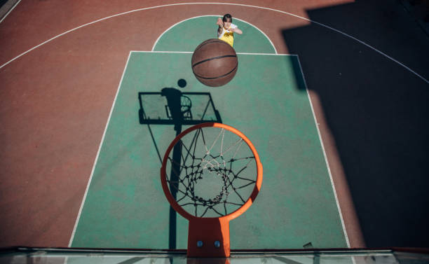 istock Woman basketball player 1170779536