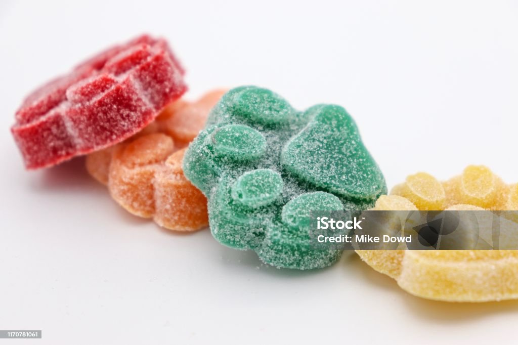 Colorful Cannabis Infused Gummies Multi colored cannabis/marijuana infused gummies Cannabis Plant Stock Photo