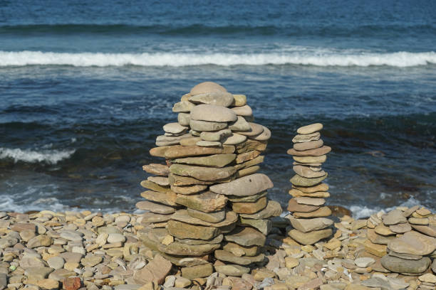 istock Seascape with pyramids of stones 1170785630