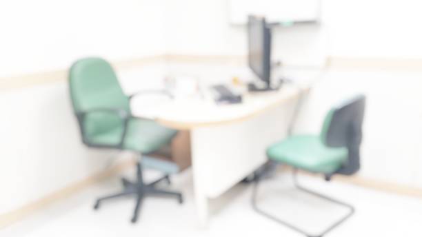 istock Blur abstract background inside empty patient examination room with bed in OPD ward. Blurry doctor desk for diagnosis sick people working space in hospital. Defocused interiors healthcare work place 1170793130
