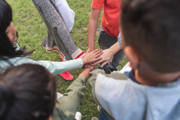 istock A group of children's hands 1170793877