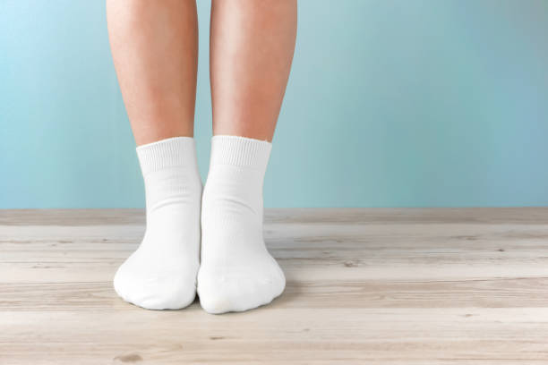 Standing in the room with socks