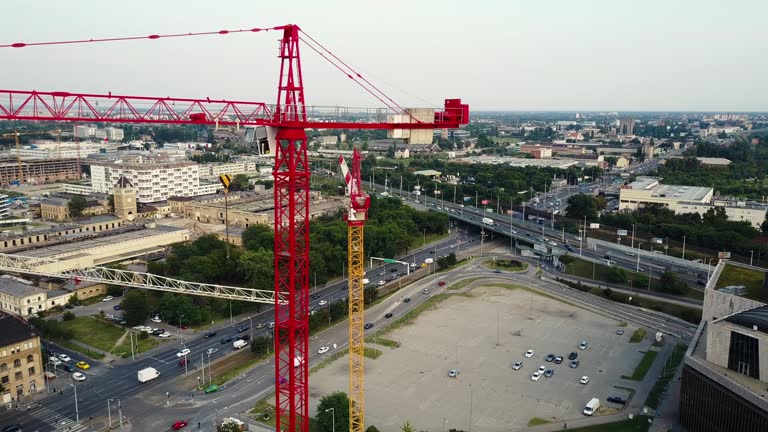 Bird eye view on construction site and crane - construction industry and development